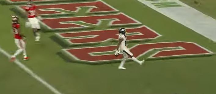 Philadelphia Eagles quarterback Jalen Hurts puts a pass only wide receiver Olamide  Zaccheaus could catch for a 34-yard TD